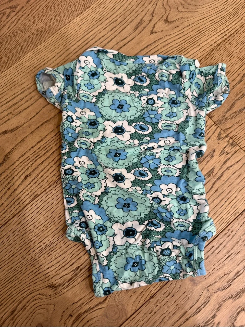kate quinn Floral Baby Onesie in Aqua, Light Blue, and White
